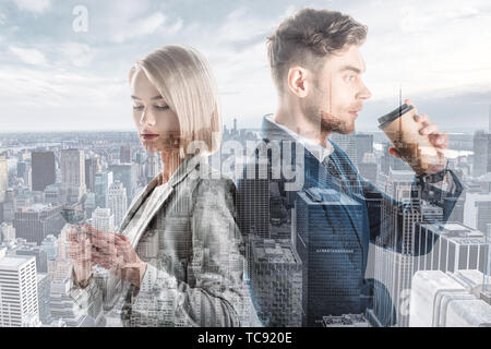 double exposure of handsome businessman and pretty businesswoman and new york cityscape Stock Photo