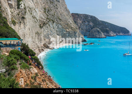 PORTO KATSIKI BEACH, LEFKADA, GREECE - JULY 16, 2014: People and yachts at blue waters of Porto Katsiki Beach, Lefkada, Ionian Islands, Greece Stock Photo