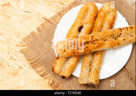 Rolllini with filling on a plate. Top view Stock Photo