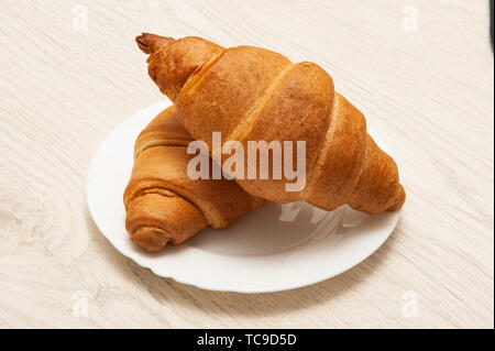 Croissants on a plate. Top view Stock Photo