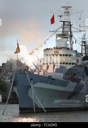 The 6 inch guns on board HMS Belfast in London are fired to mark the 75th anniversary of the D-Day landings. Stock Photo