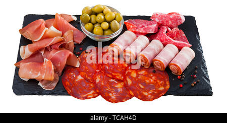 Spanish sausage sliced - chorizo, fuet, jamon, salami, bacon. Isolated over white background Stock Photo