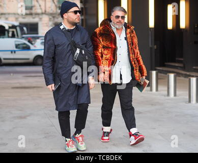 MILANO, Italy: 12 January 2019: Fashion bloggers street style outfits before Neil Barrett fashion show during Milano fashion week Man fall/winter 2019 Stock Photo