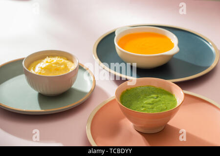 Homemade vegetable baby food purees in glass jars Stock Photo