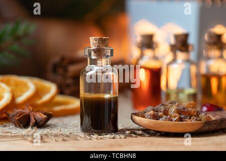 A bottle of myrrh essential oil with resin Stock Photo - Alamy