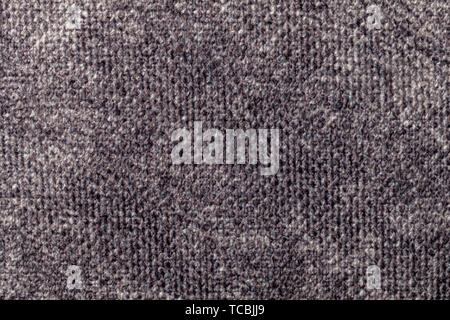 Light gray background from a soft textile material. sheathing fabric with natural texture. Cloth backdrop. Stock Photo
