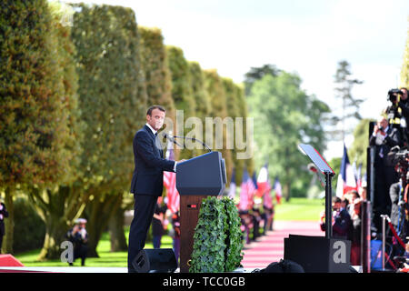Colleville Sur Mer, France. 06th June, 2019. French President Emmanuel Macron delivers his address during a commemoration ceremony marking the 75th D-Day Anniversary at the Normandy American Cemetery and Memorial June 6, 2019 in Colleville-sur-Mer, France. Thousands have converged on Normandy to commemorate the 75th anniversary of Operation Overlord, the WWII Allied invasion commonly known as D-Day. Credit: Planetpix/Alamy Live News