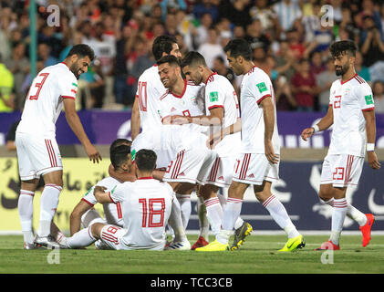 Tehran, Iran. 6th June, 2019. Players of Iran celebrate their goal during a friendly football match between Iran and Syria at Azadi Stadium in Tehran, Iran, June 6, 2019. Iran won 5-0. Credit: Ahmad Halabisaz/Xinhua/Alamy Live News Stock Photo