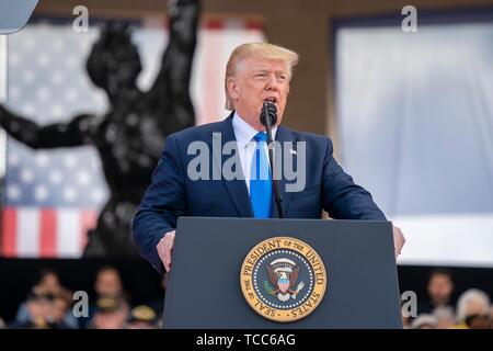 Colleville Sur Mer, France. 06th June, 2019. U.S. President Donald Trump delivers his address at the commemoration ceremony marking the 75th D-Day Anniversary at the Normandy American Cemetery and Memorial June 6, 2019 in Colleville-sur-Mer, France. Thousands have converged on Normandy to commemorate the 75th anniversary of Operation Overlord, the WWII Allied invasion commonly known as D-Day. Credit: Planetpix/Alamy Live News