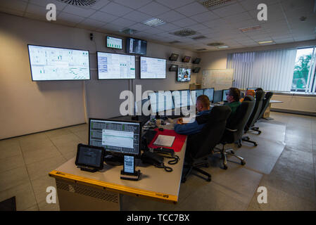 Gdansk, Poland. 23rd May, 2019. Technicians at the control room of a Thermal Waste Recycling Facility in Gdansk.The first Polish thermal waste treatment plant, Ecospalarnia enables the transformation of 220,000 tons of municipal waste during the year. As a result of the combustion, electricity is produced (approximately 65,000 MWh), and thermal energy (280,000 MWh). The energy obtained in the process of thermal transformation is in a large part renewable energy, and therefore ecological. Credit: Omar Marques/SOPA Images/ZUMA Wire/Alamy Live News Stock Photo