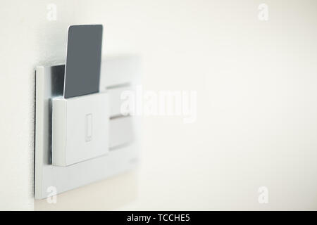 Modern door room with card key in hotel room close up Stock Photo