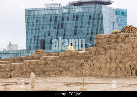 Archaeoligist at work at Huaca Pucllana, pre Columbian, pre Inca, pyramid temple, tomb and administrative center, frog shaped, adobe mound, and museum Stock Photo