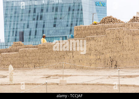 Archaeoligist at work at Huaca Pucllana, pre Columbian, pre Inca, pyramid temple, tomb and administrative center, frog shaped, adobe mound, and museum Stock Photo