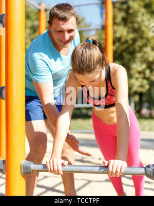 Preteen Girl Doing Push-ups Stock Photo - Alamy