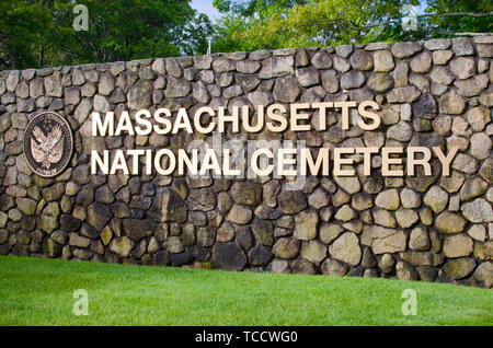 Massachusetts National Cemetery entrance wall with sign in Bourne, Cape Cod, Massachusetts USA Stock Photo