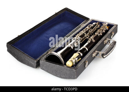 Antique clarinet in case isolated on white Stock Photo