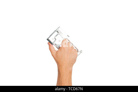 Tool. Hand is holding industrial stapler isolated on a white background . Stock Photo