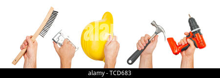 Hand tools. Hands holding construction tools isolated on white background. Stock Photo