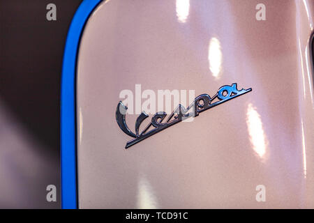 BELGRADE, SERBIA - MARCH 23, 2019: Detail of the Vespa Elettrica scooter in Belgrade, Serbia. Vespa Vespa is an Italian brand of scooter manufactured  Stock Photo