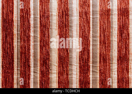 red striped synthetic woven upholstery fabric close-up texture Stock Photo
