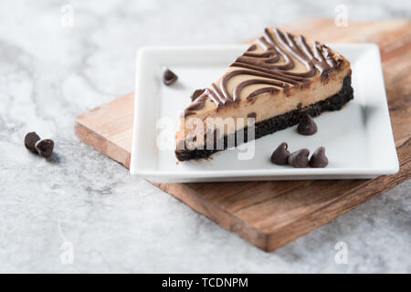 Chocolate peanut butter swirl cheesecake dessert Stock Photo