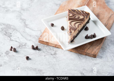 Chocolate peanut butter swirl cheesecake dessert Stock Photo