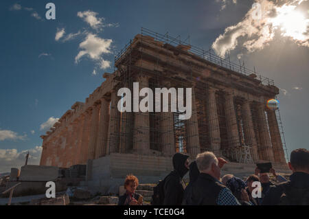 ATHENS GREECE - OCTOBER 25 2018: Tourists under the columns of Parthenon Stock Photo