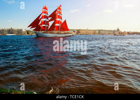 St Petersburg, Russia - June 6, 2019. Swedish brig Tre Kronor with Scarlet sails on the Neva river. Scarlet Sails is the Russian holiday of school gra Stock Photo