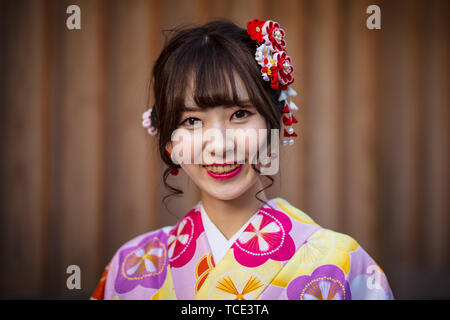 Japanese Woman Dressed in Kimono Stock Photo