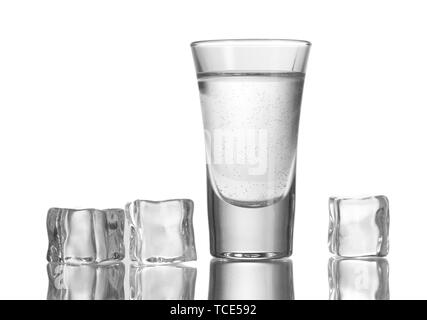 glass of vodka with ice isolaled on white Stock Photo