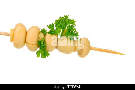 Marinated mushroom on a skewer isolated on white Stock Photo