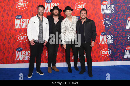 Nashville. 5th June, 2019. (L-R) Chris Thompson, James Young, Jon Jones and Mike Eli of the Eli Young Band attend the 2019 CMT Music Awards at the Bridgestone Arena on June 5, 2019 in Nashville, Tennessee. Credit: Debby Wong/Pacific Press/Alamy Live News Stock Photo