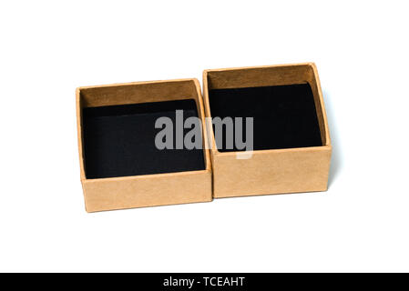 Empty opened brown small cardboard box with lid for mock up isolated on white background. Stock Photo