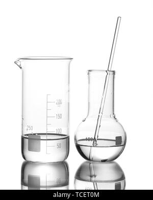 Measuring beaker and flask with water and with reflection isolated on white Stock Photo