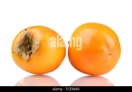 Two appetizing persimmons isolated on white Stock Photo