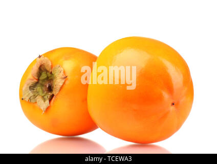 Two appetizing persimmons isolated on white Stock Photo