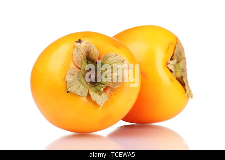 Two appetizing persimmons isolated on white Stock Photo