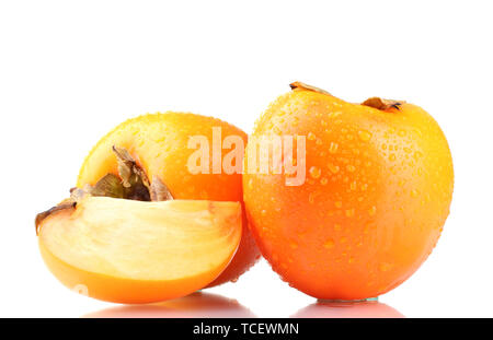 Appetizing persimmons with droplets isolated on white Stock Photo