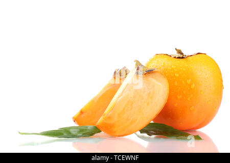 Appetizing persimmons with droplets isolated on white Stock Photo