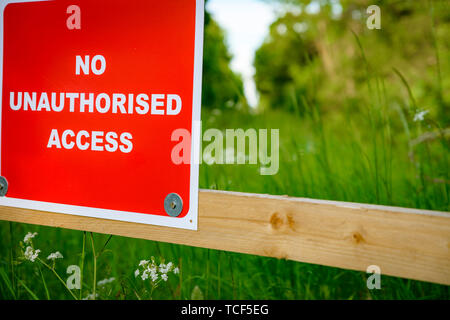 Warning signs around site of future High Speed Rail Track (HS2) Near Bicester, Oxfordshire, UK Stock Photo