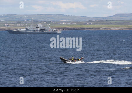 A navy rhib patrols the waters by Doonbeg Golf resort in Co Clare where US President Donald Trump is staying during his visit to the Republic of Ireland prior to his departure from Shannon Airport later on Friday. Stock Photo