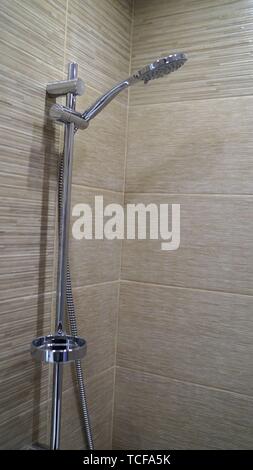 shower and shower holder. modern chrome shower attachment with thermostatic controller Stock Photo