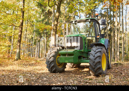 Forestry tractor or forestry tractor for harvesting wood in the forest Stock Photo