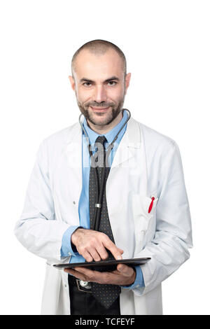 Portrait of smiling doctor with a tablet.Isolated on white. Stock Photo