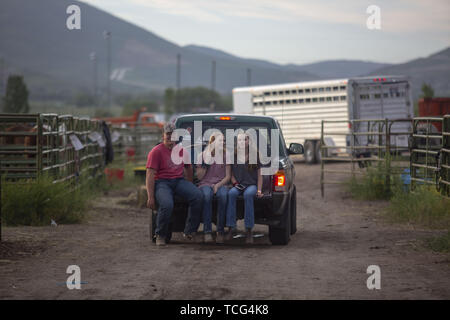 Heber City, Utah, USA. 7th June, 2019. Teenagers in the back of a truck at the Utah High School Rodeo Association Finals in Heber City Utah, June 7, 2019. Students from across the state of Utah gathered to compete in Barrel Racing, Pole Bending, Goat Tying, Breakaway Roping, Cow Cutting, Bull Riding, Bareback Riding, Saddle Bronc Riding, Tie Down Roping, Steer Wrestling, and Team Roping. Credit: Natalie Behring/ZUMA Wire/Alamy Live News Stock Photo