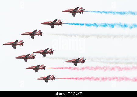 London, UK. 05th June, 2019. The Red Arrows fly overhead during a D-Day National Commemorative Event Wednesday, June 5, 2019, at the Southsea Common in Portsmouth, England. People: President Donald Trump Credit: Storms Media Group/Alamy Live News Stock Photo