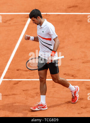 Paris, France.  8th June, 2019. Novak Djokovic of Serbia reacts during the men's singles semifinal match with Dominic Thiem of Austria at French Open tennis tournament 2019 at Roland Garros, in Paris, France on June 8, 2019. Credit: Han Yan/Xinhua/Alamy Live News Stock Photo