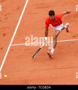 Paris, France.  8th June, 2019. Novak Djokovic of Serbia competes during the men's singles semifinal match with Dominic Thiem of Austria at French Open tennis tournament 2019 at Roland Garros, in Paris, France on June 8, 2019. Credit: Han Yan/Xinhua/Alamy Live News Stock Photo