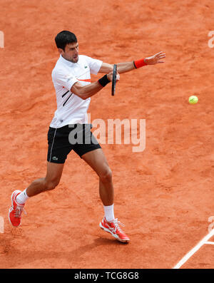 Paris, France.  8th June, 2019. Novak Djokovic of Serbia competes during the men's singles semifinal match with Dominic Thiem of Austria at French Open tennis tournament 2019 at Roland Garros, in Paris, France on June 8, 2019. Credit: Han Yan/Xinhua/Alamy Live News Stock Photo