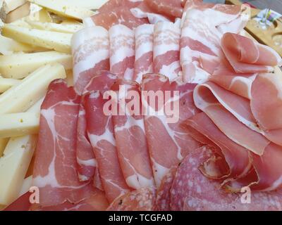 Image of assorted delicious cheese and meats, top down view Stock Photo